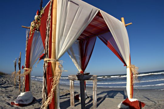 tropical wedding arbor on the beach