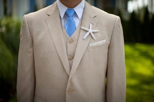 starfish as grooms boutonnière