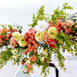 Colorful flower arrangement on arbor