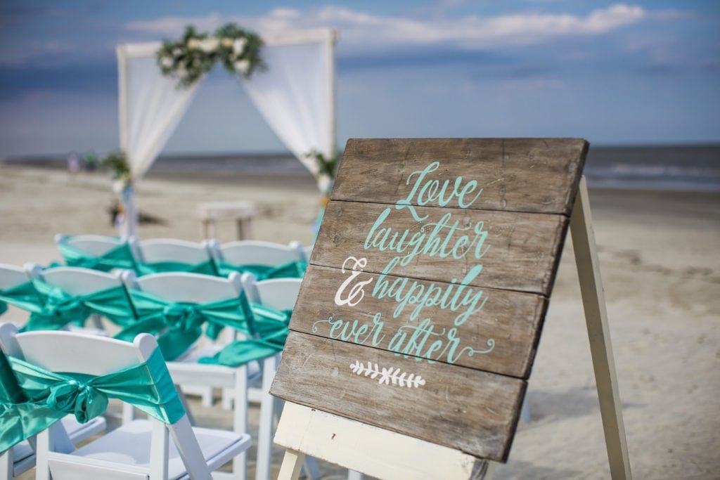 wooden sign beach wedding decoration