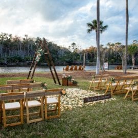 outdoor wedding ceremony with arbor