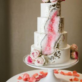 Pink and white geode themed wedding cake