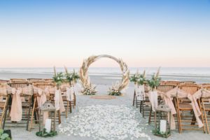 a boho arbor for an altar at a beach wedding in st augustine beach, beach wedding, best st augustine wedding planner