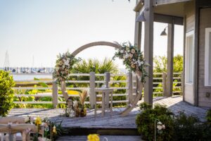 a simple boho arch for a florida beach wedding, diy beach wedding, beach wedding