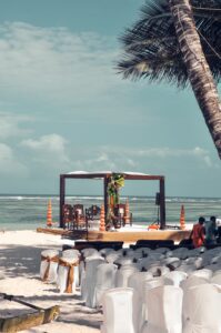 a boho beach wedding setup on the florida beach, wedding planner, beach wedding in florida