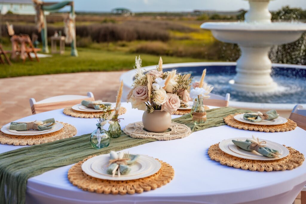 a gorgeous table that is set for a wedding in floria, luxury wedding venue florida, beach wedding planner