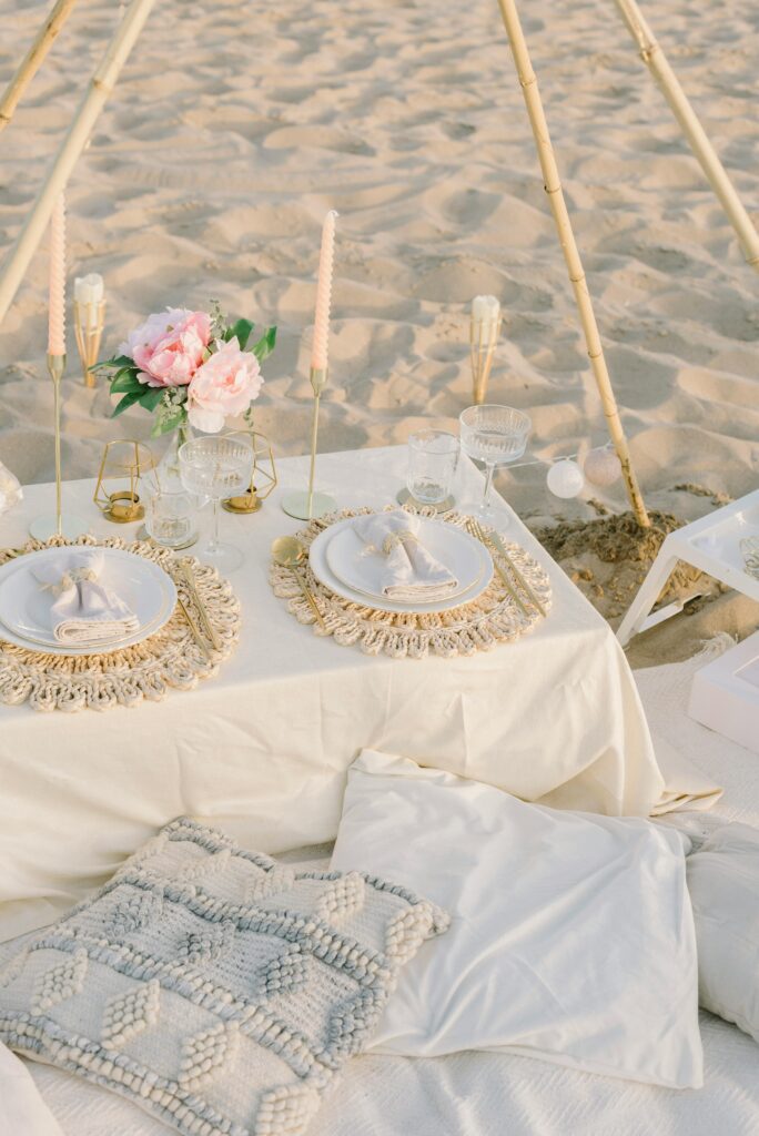 Beach party decoration ideas for a bride and groom’s placement setup at a beach wedding ceremony