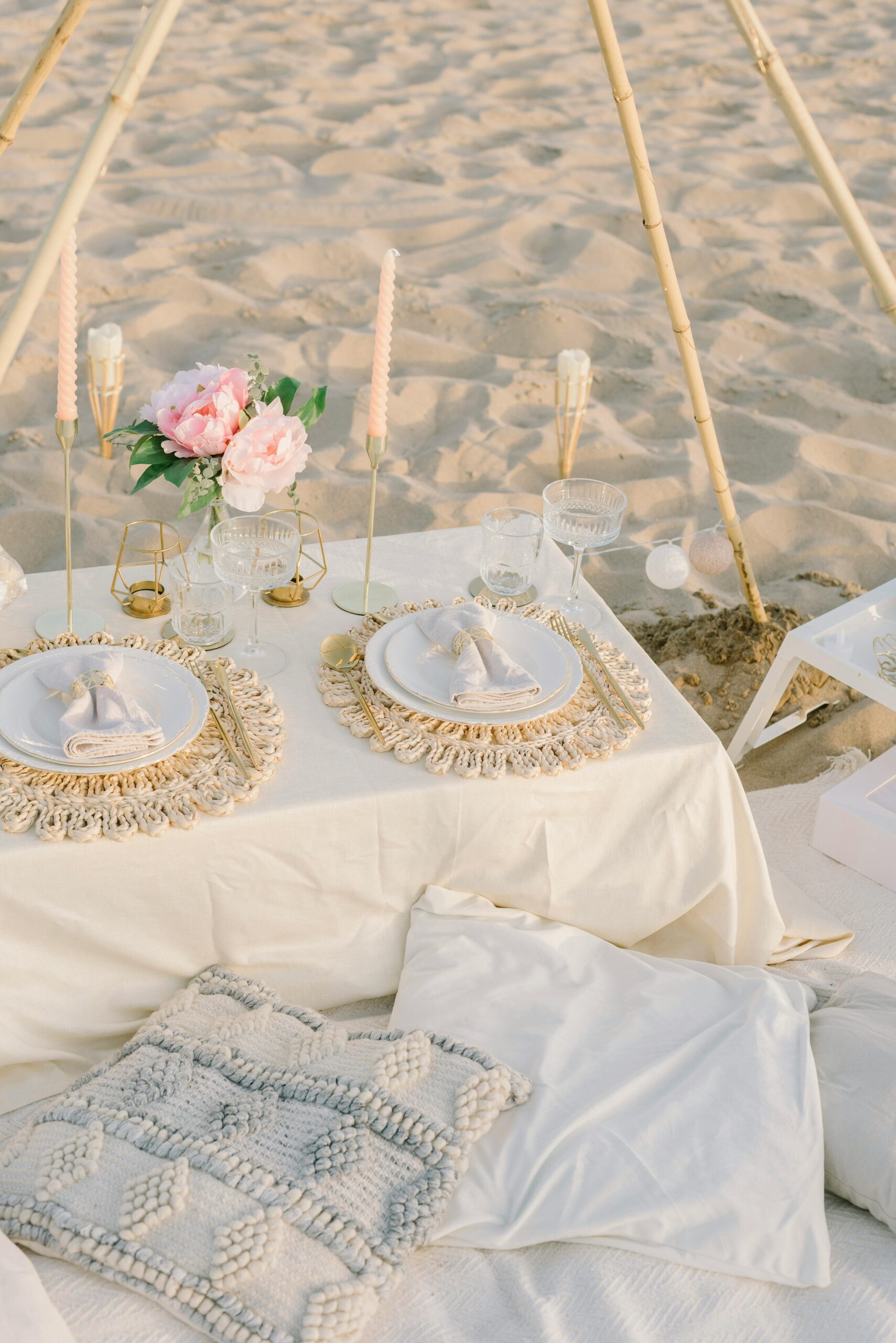 Beach party decoration ideas for a bride and groom’s placement setup at a beach wedding ceremony